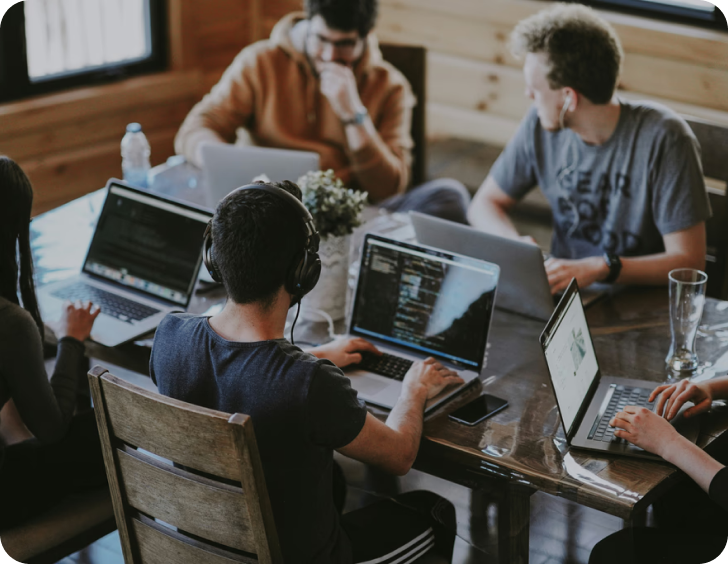 Ecommerce team collaborating at shared workspace